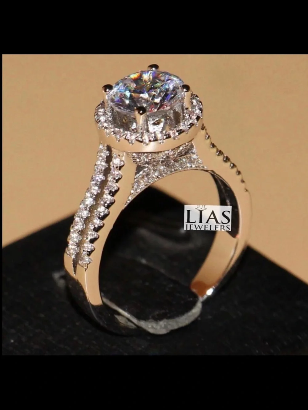 New 18k white gold engagement ring